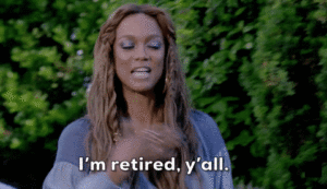 Retired model, Tyra Banks, waves her hands with the caption, "I'm retired, y'all."